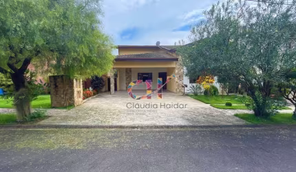 Casa com 3 dormitórios à venda, 335 m² por R$ 1.600.000,00 - Condomínio Residencial Terras do Caribe - Valinhos/SP