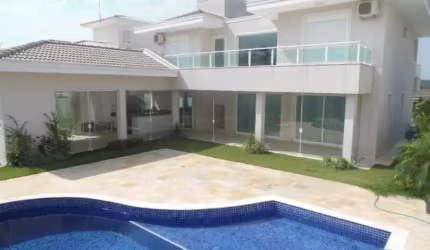 Casa em condomínio fechado Portal do Paraíso II, permuta, aquecimento solar, planejados, piscina.