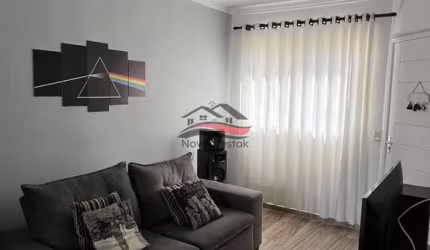 Casa 2 dormitórios em condomínio com rua asfaltada golfinho Caraguatatuba