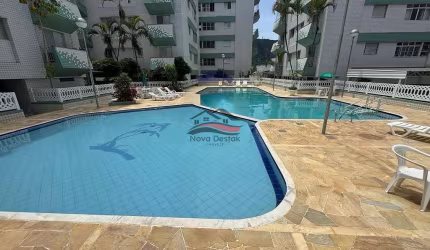 Apartamento à venda no Centro de Caraguatatuba, SP - 77m² com 3 dormitórios, sala ampla e cozinha americana.