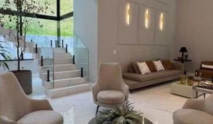 Casa em Alphaville com 4|4, 06G e 715M²