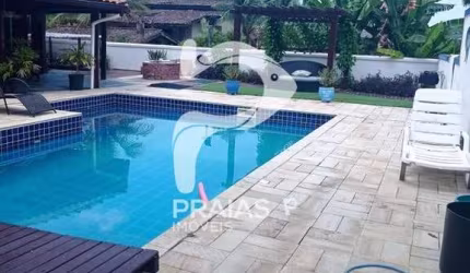Casa em condomínio fechado com 4 quartos à venda na Dois, --, Enseada, Guarujá por R$ 1.500.000