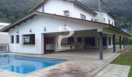 Casa em condomínio fechado com 5 quartos à venda na Dois, --, Enseada, Guarujá por R$ 1.900.000