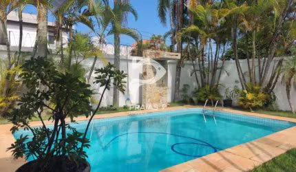 Casa com 3 quartos à venda na Tarumã, --, Enseada, Guarujá por R$ 1.300.000