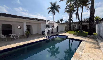 Casa em condomínio fechado com 4 quartos à venda na Julieta de Azevedo Bonavides (rua 27), --, Jardim Acapulco, Guarujá por R$ 1.800.000