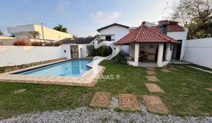 Casa em condomínio fechado com 4 quartos à venda na Nicolau Vitiello (rua 45), --, Jardim Acapulco, Guarujá por R$ 1.600.000