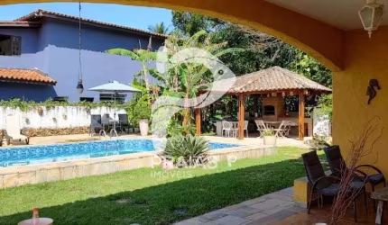 Casa com 3 quartos à venda na Avenida das Amendoeiras, --, Balneário Praia do Pernambuco, Guarujá por R$ 1.300.000