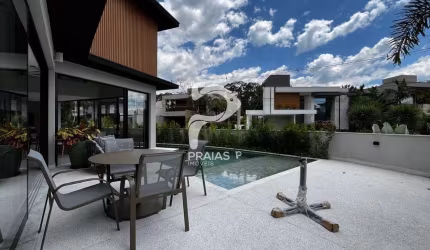 Casa em condomínio fechado com 5 quartos à venda na Rua Passeio de Ilheus, --, Riviera, Bertioga por R$ 7.900.000