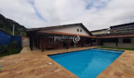 Casa em condomínio fechado com 4 quartos à venda no Balneário Praia do Pernambuco, Guarujá  por R$ 1.400.000