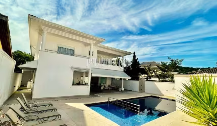 Casa em condomínio fechado com 5 quartos à venda no Jardim Acapulco, Guarujá  por R$ 3.850.000