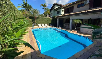 Casa em condomínio fechado com 4 quartos à venda no Balneário Praia do Pernambuco, Guarujá  por R$ 1.900.000
