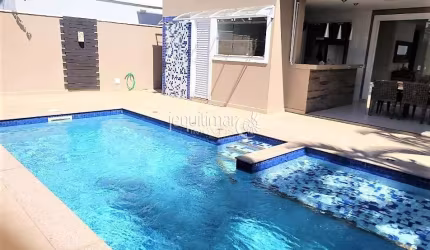 Casa em condomínio fechado com 3 quartos à venda no Balneário Praia do Pernambuco, Guarujá  por R$ 1.800.000