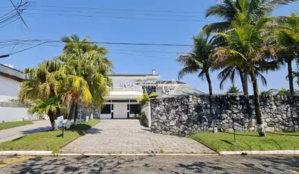 Casa em condomínio fechado com 6 quartos para alugar no Jardim Acapulco, Guarujá  por R$ 23.000