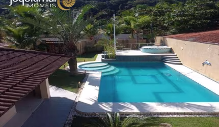 Casa em condomínio fechado com 3 quartos à venda no Balneário Praia do Pernambuco, Guarujá  por R$ 1.400.000