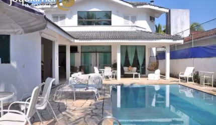 Casa em condomínio fechado com 4 quartos à venda no Jardim Acapulco, Guarujá  por R$ 2.350.000