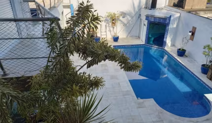Casa em condomínio fechado com 4 quartos à venda no Jardim Acapulco, Guarujá  por R$ 2.800.000