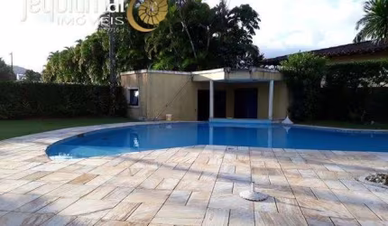 Casa em condomínio fechado com 4 quartos para alugar no Jardim Acapulco, Guarujá  por R$ 15.000
