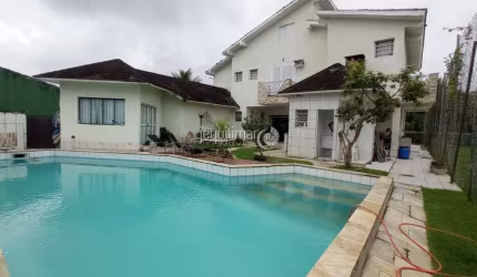 Casa em condomínio fechado com 5 quartos à venda no Jardim Acapulco, Guarujá  por R$ 3.600.000
