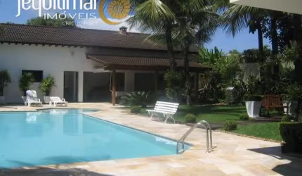 Casa em condomínio fechado com 5 quartos à venda no Jardim Acapulco, Guarujá  por R$ 4.500.000
