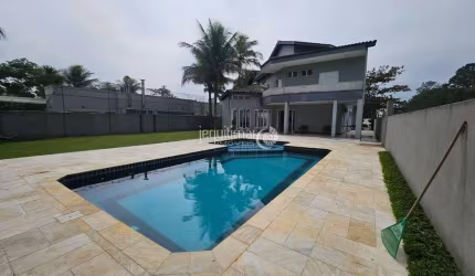 Casa em condomínio fechado com 5 quartos à venda no Jardim Acapulco, Guarujá  por R$ 3.000.000