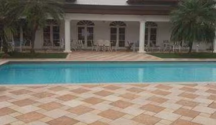 Casa em condomínio fechado com 4 quartos para alugar no Jardim Acapulco, Guarujá  por R$ 18.000