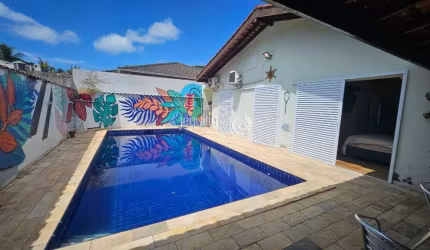 Casa em condomínio fechado com 4 quartos à venda no Balneário Praia do Pernambuco, Guarujá  por R$ 990.000