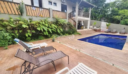 Casa em condomínio fechado com 4 quartos à venda na Enseada, Guarujá  por R$ 1.800.000