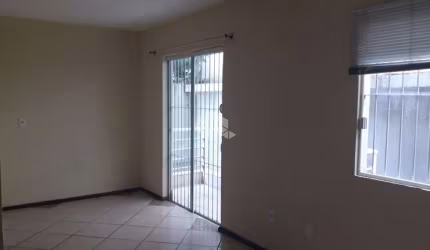 Kitnet  com sacada à venda no bairro Centro, em Santa Maria, RS.