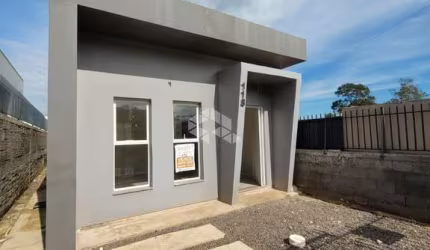 Casa de 2 dormitórios com garagem no bairro Jardim Luciana em São Leopoldo.