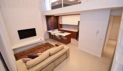 Apartamento tipo Loft mobiliado à venda com 1 suíte, lavabo, 1 vaga e hobby-box na Carvoeira, Florianópolis/SC