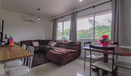 Apartamento com 2 dormitórios, sendo 1 suíte e 1 vaga no bairro Jardim Botânico