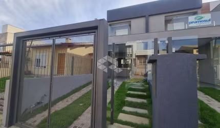 CASA  EM CONDOMÍNIO  NOVA DE 3 DORM , SUÍTE  E 2 VAGAS DE GARAGEM