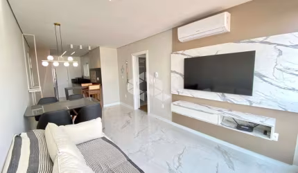 Apartamento com 2 dormitórios/quartos e 1box/vaga no bairro Navegantes em Capão da Canoa/RS