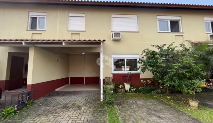 Sobrado em condomínio, 3 dormitórios, 3 vagas, bairro Harmonia Canoas