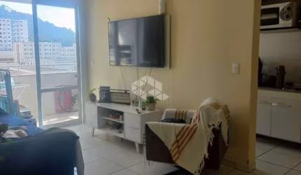 APARTAMENTO NO BAIRRO AREIAS, EM SÃO JOSÉ, SC, SACADA, CHURRASQUEIRA, 02 DORMITÓRIOS SENDO 01 SUÍTE, 01 VAGA DE GARAGEM.