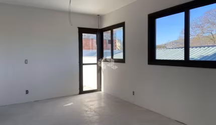 Apartamento Garden com 1 dormitório, sendo 1 suíte e 1 vaga no bairro Jardim Botânico