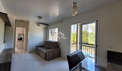Apartamento 2 dormitórios com vaga de garagem.