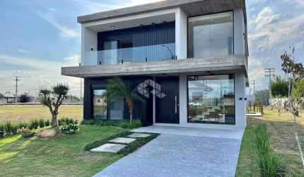 Casa de 4 suítes em condomínio fechado Sunset Xangri-lá