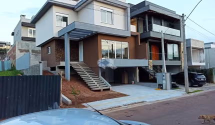 Excelente Casa NOVA no Condomínio de alto padrão 04 dormitórios em Gravataí