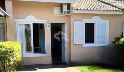 Casa dois dormitórios em condomínio Rio Branco Canoas