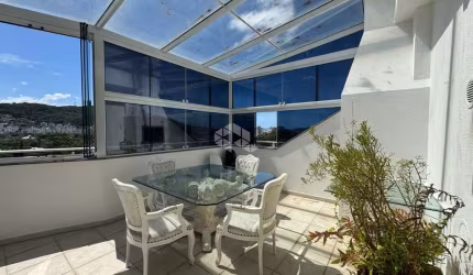 APARTAMENTO SEMIMOBILIADO COM 2 QUARTOS SENDO 1 SUÍTE E 2 VAGAS DE GARAGEM NO BAIRRO CÓRREGO GRANDE EM FLORIANÓPOLIS/SC