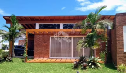 Casa de Condomínio em Atlântida