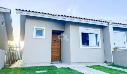 ICasa a venda com 02 dormitorios, sala cozinha conjulgados, banheiro, pátio , vaga de garagem, em frente a casa em condomínio fechado