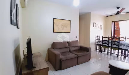 Apartamento mobiliado de 3 dormitórios com churrasqueira próximo a PUCRS