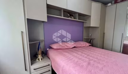 Apartamento semi mobiliado 2 dormitorio e vaga escriturada a venda no bairro Partenon.