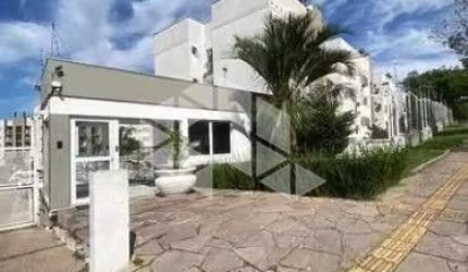 Apartamento térreo com 60 m², 2 dormitórios, churrasqueira e 1 vaga na Cavalhada
