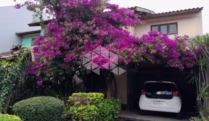 Casa 3 dormitórios para venda no bairro Hípica Condomínio Jardins do Prado