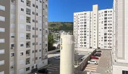 Apartamento novo de 2 quartos, sacada com churrasqueira e vaga no Morro Santana