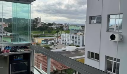 APARTAMENTO 2 QUARTOS SENDO UM SUÍTE- BAIRRO BARREIROS- SÃO JOSÉ- SC