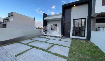 Linda casa Térrea, 3 Dormitórios sendo 1 suíte , localizado no Bairro Reserva Bela Vista.